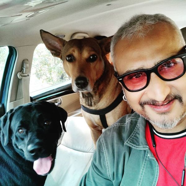 Awdhesh Mishra with his pet dogs