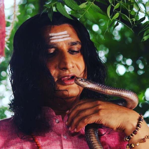 Awadhesh Mishra with snake cobra