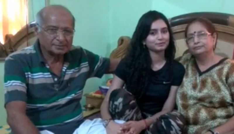 Rishika Singh Chandel with her Parents