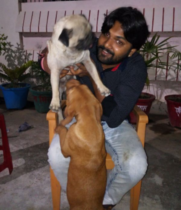 Samar Singh with his pet dogs