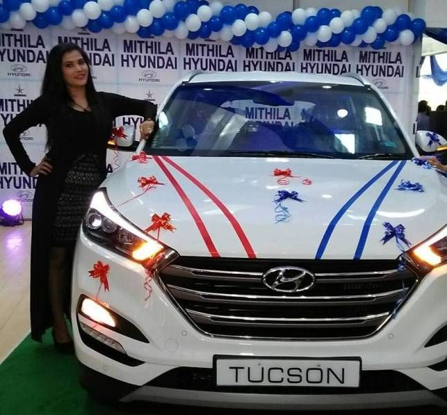 Seema Singh with her SUV Hyundai Tucson