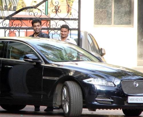 Karan Johar with his Jaguar XF car