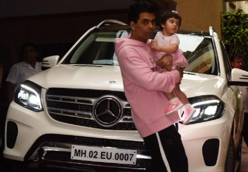 Karan Johar with his Mercedes Benz car