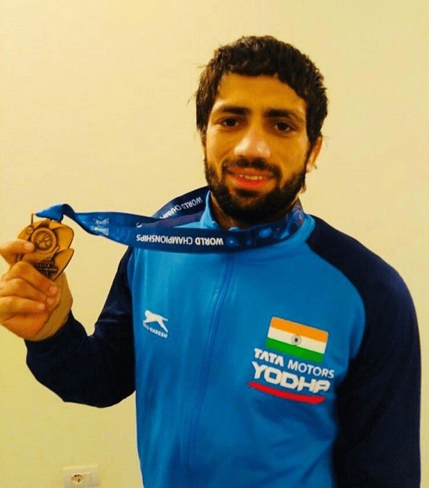 Ravi Kumar with a bronze medal