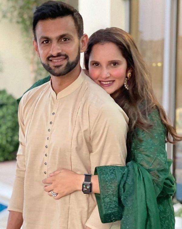 Shoaib Malik with his wife