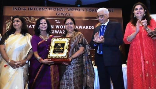 Baby Rani Maurya receiving the Great Indian Woman Award 2021