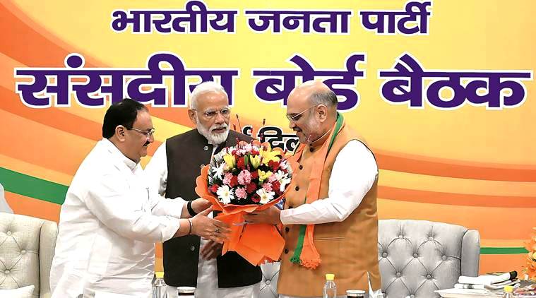 JP Nadda with Amit Shah right and Narendra Modi center after being named as BJP National President