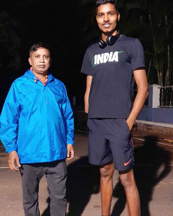 Nishad Kumar with his coach