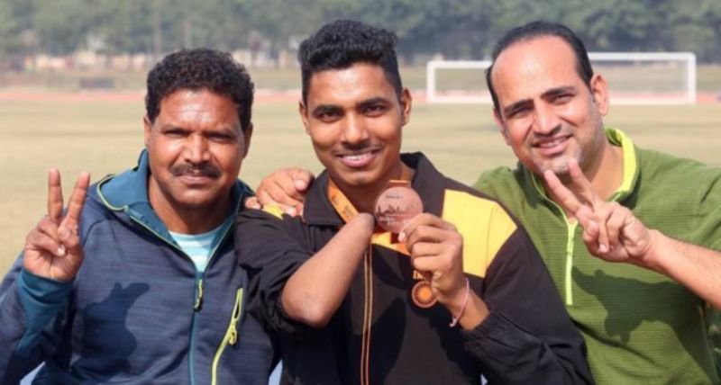 Nishad Kumar with his coaches Naseem Ahmed and Vikram Chaudhary