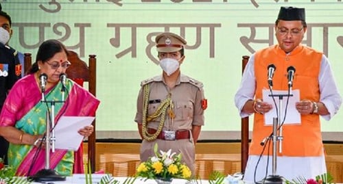 Pushkar Singh Dhammi taking oath as the chief minister of India