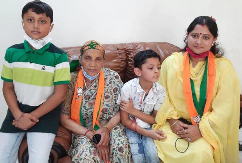 Pushkar Singh Rawat's mother, son and wife