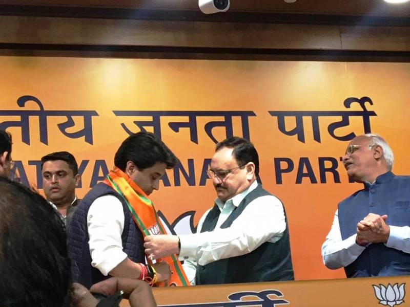 BJP president JP Nadda formally inducts Jyotiraditya Scindia into the BJP at the party headquarters in New Delhi 11 March 2020