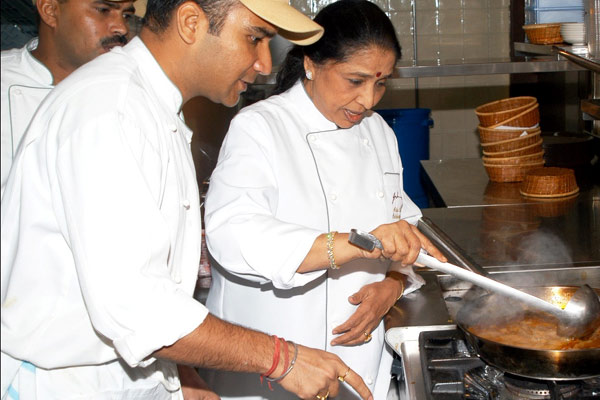Asha cooking at her restaurant in Dubai