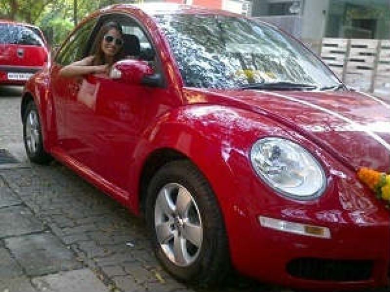Bipasha Basu in her Volkswagen Beetle car