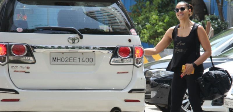 Bipasha Basu with her Toyota Fortuner car