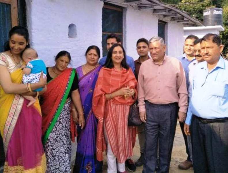Bipin Rawat with his family members in his native village in Uttarakhand