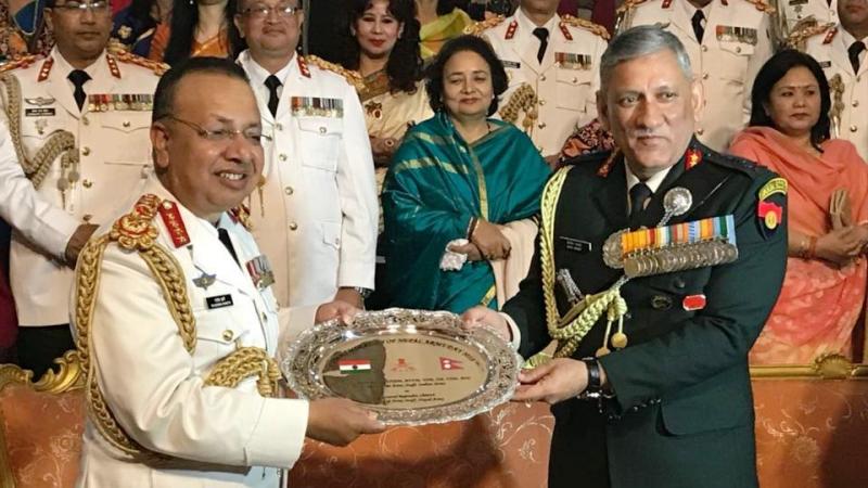 General Bipin Rawat presents a memento to General Rajendra Chhetri, Chief of the Army Staff Nepal Army, on the occasion of Nepal Army Day 2018