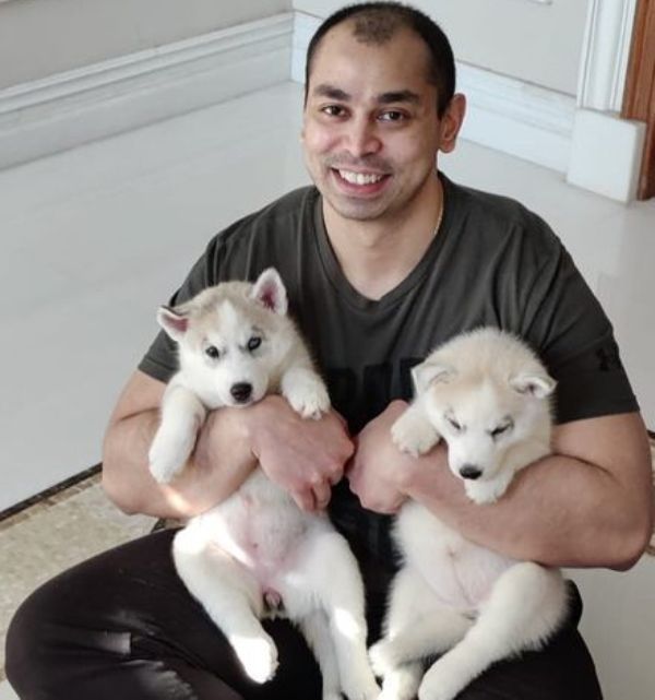Prateek Yadav with his pet dogs