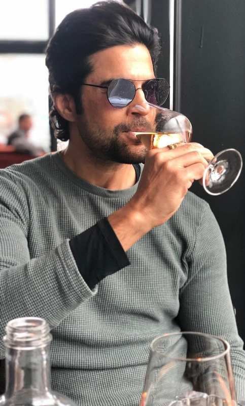 Rajeev Khandelwal drinking wine
