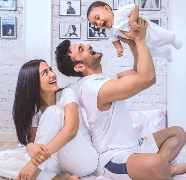 Amrita Rao with her son and husband