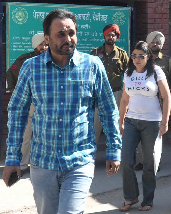 Bhagwant Mann and his wife, Inderpreet Kaur, outside Mohali court after filing a divorce in 2015