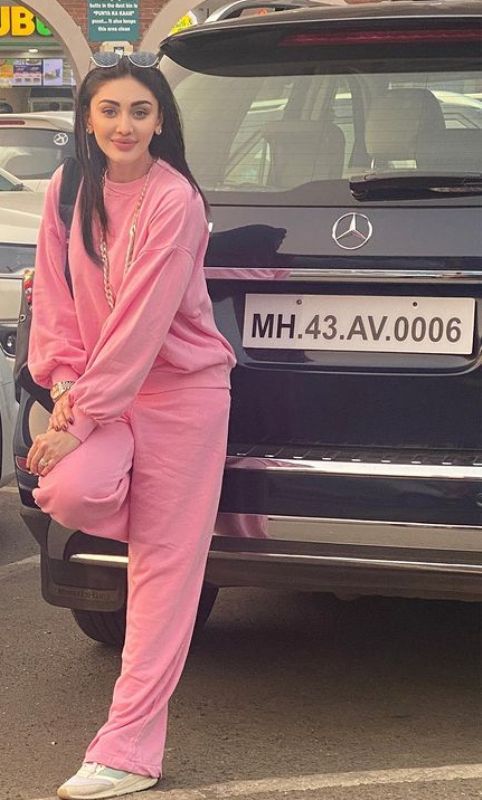 Shefali Jariwal with her Mercedes-Benz car