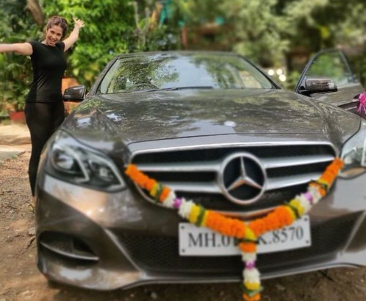 Harleen Sethi with her Mercedes-Benz car
