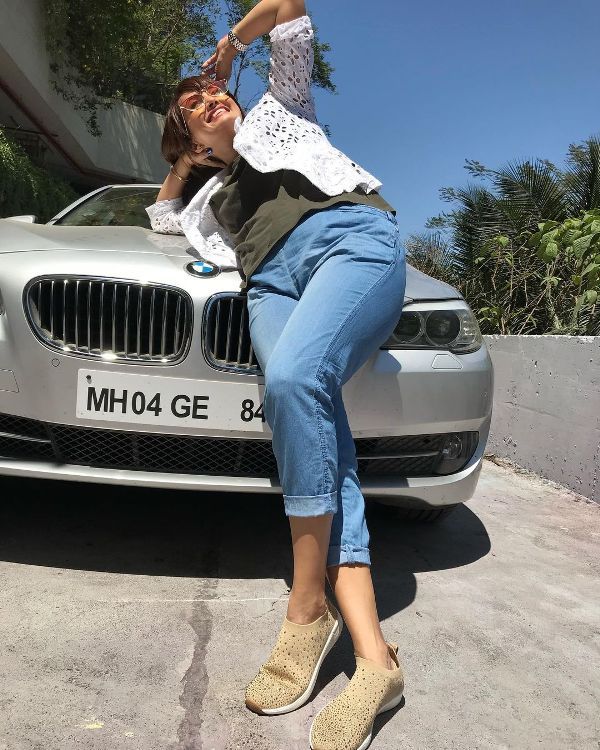 Nisha Rawal with her BMW car