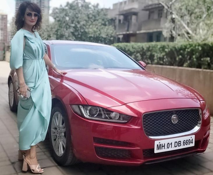 Nisha Rawal with her Jaguar car