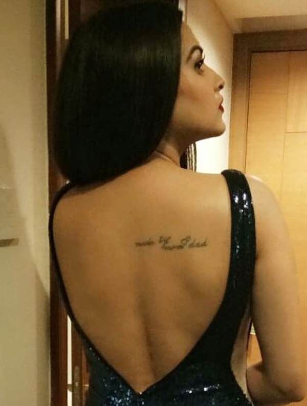Himanshi Khurana's tattoo on her back