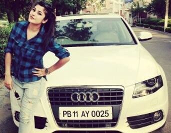 Shehnaz Kaur Gill with Audi car