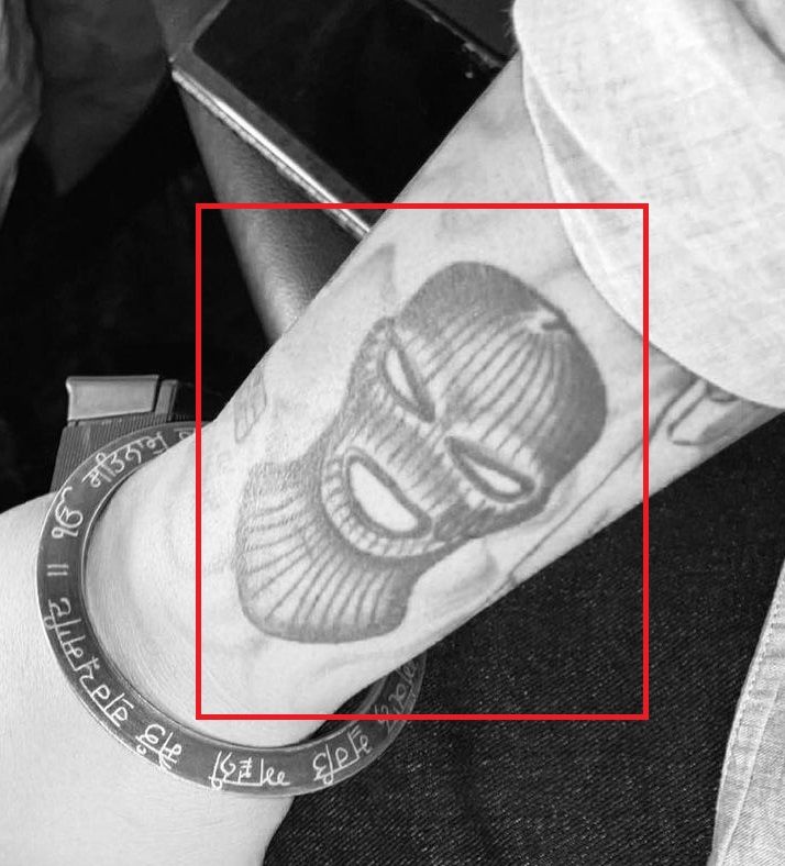 'Ski Mask’ tattoo on his right forearm