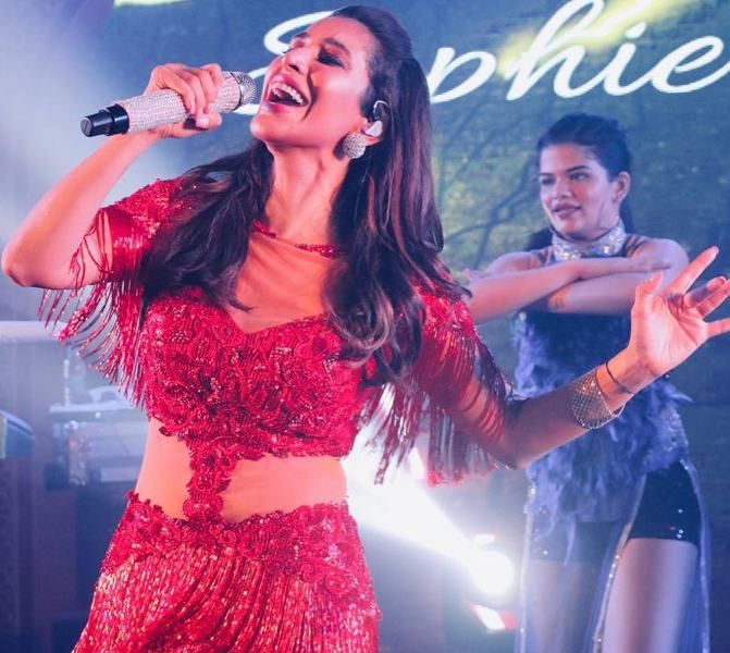 Sophie Choudry performing stage show