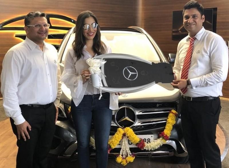 Sophie Choudry with her Mercedes Benz car