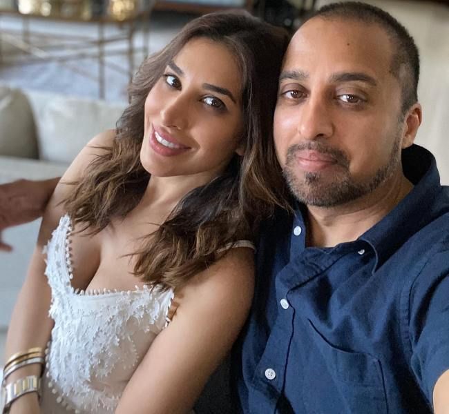 Sophie Choudry with her brother