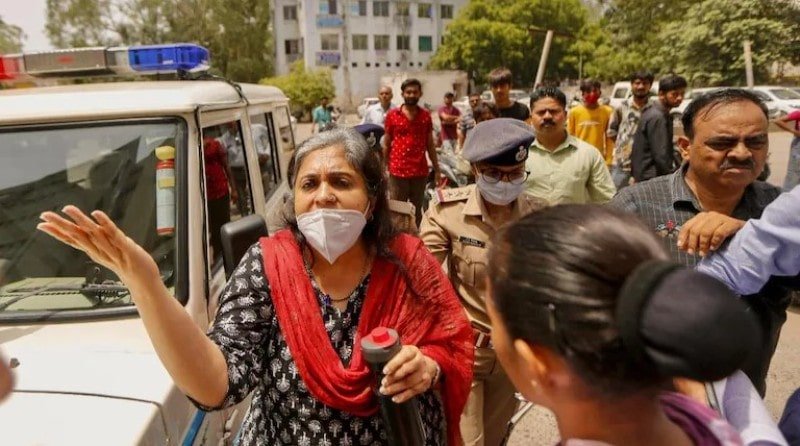 Teesta Setalvad being taken to the Juhu police station in Mumbai