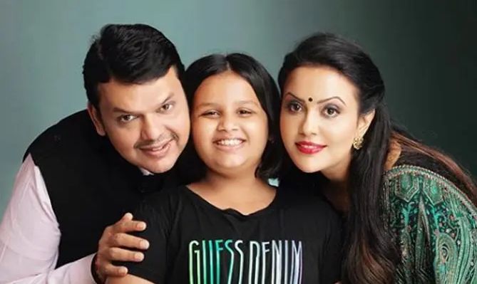 Devendra Fadnavis with his daughter and wife