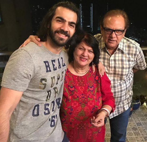 Karan V Grover with his parents