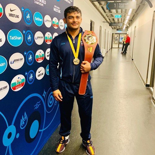 Deepak Punia after winning the gold medal and belt at the Asian Wrestling Championships