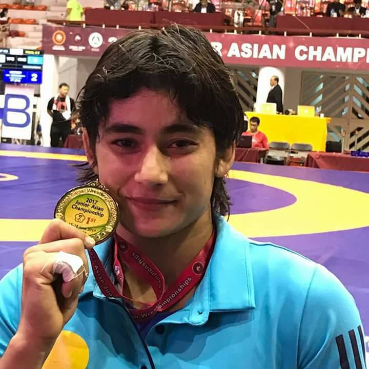 Pooja Gehlot with her gold medal that she won in Taiwan