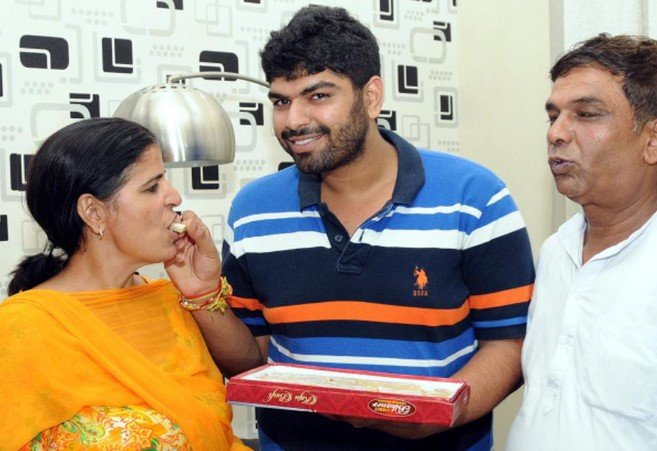 The brother and parents of Sakshi Malik