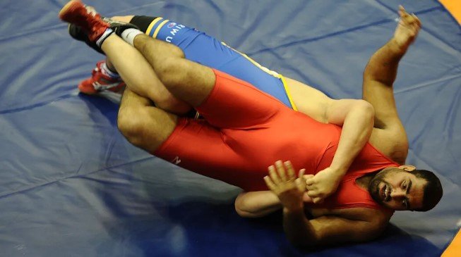 Wrestler Naveen Kumar while wrestling