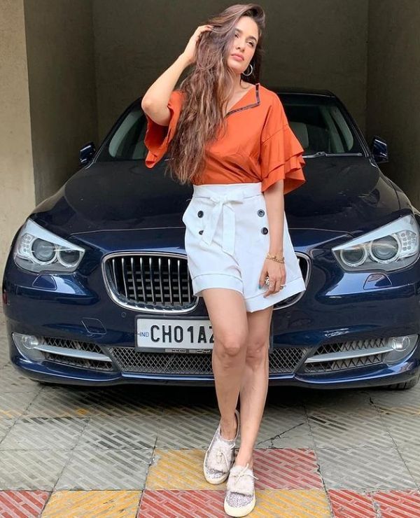 Yuvika Chaudhary with BMW car
