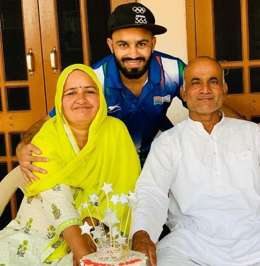 Amit Panghal with his parents