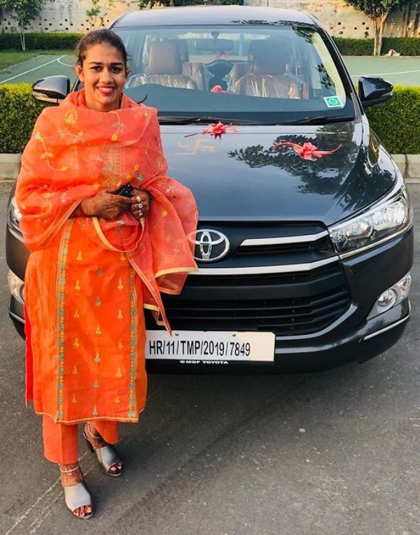 Babita Kumari with her Toyota Innova Crysta car
