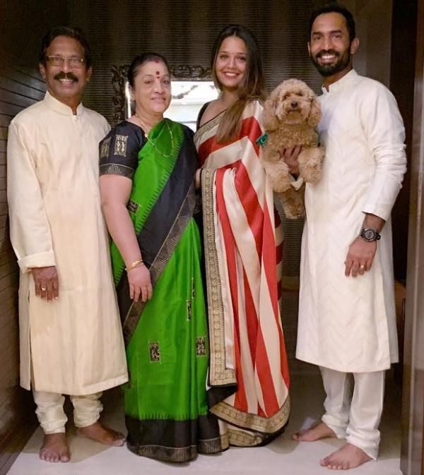 Dipika Pallikal with her father-in law, mother-in law and husband