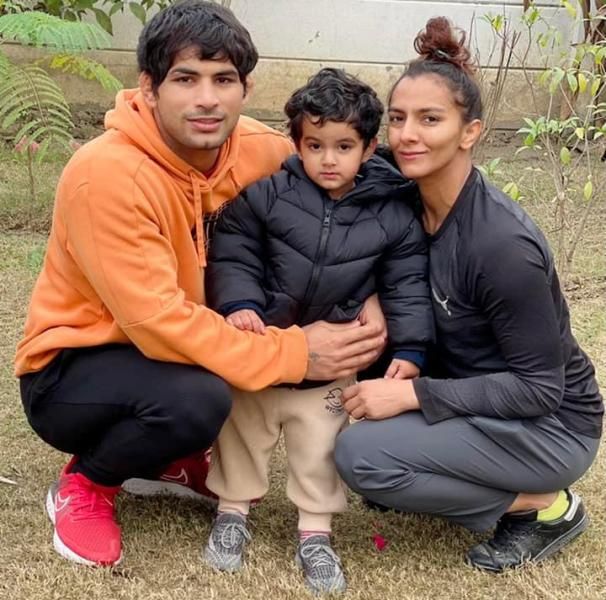 Geeta Phogat with her son and husband