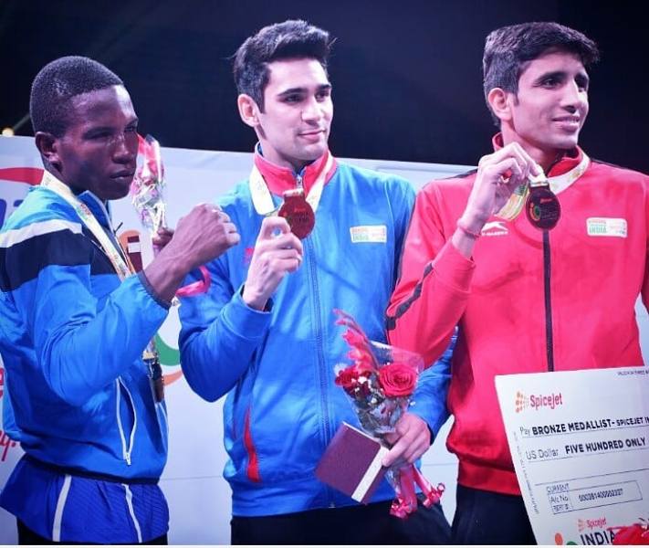 Rohit Tokas posing with his gold medal at the India Open International Boxing Championship 2018