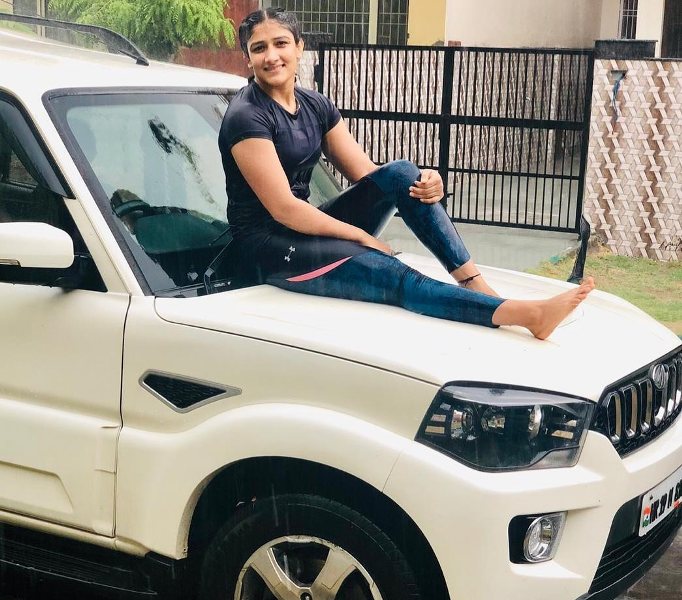 Sangeeta Phogat with her Mahindra Scorpio car