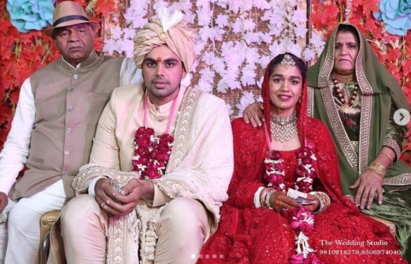 Vivek Suhag with his father in law and mother in law